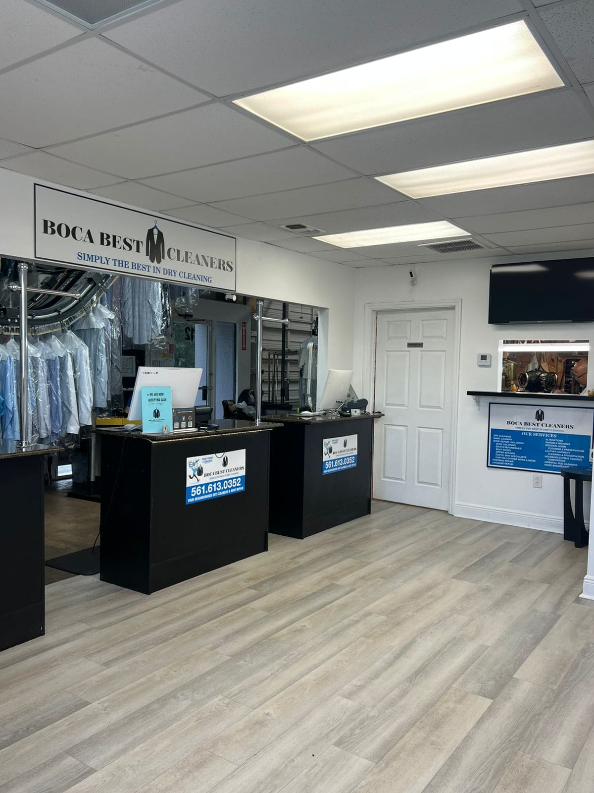 Garment-care counter inside Boca Best Cleaners